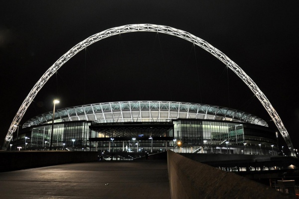 Wembley Stadium lit up at night